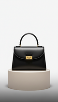 Structured Clutch With Bold Hardware